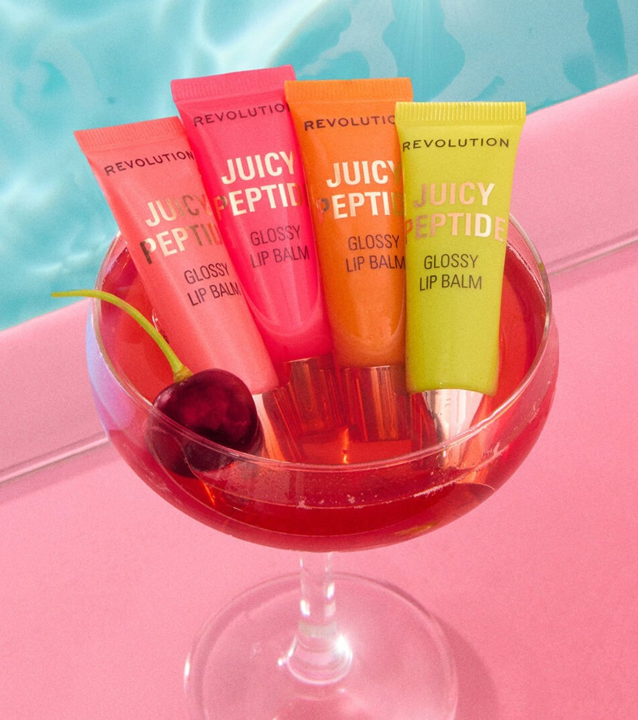 Makeup Revolution - Bálsamo labial con brillo Juicy Peptide - Peach Bellini Orange